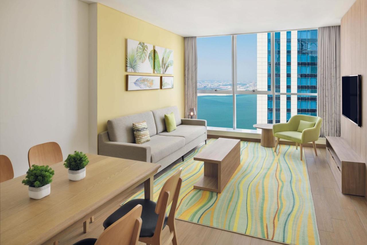 Element By Westin City Center Ντόχα Εξωτερικό φωτογραφία A typical living room in a two-bedroom apartment