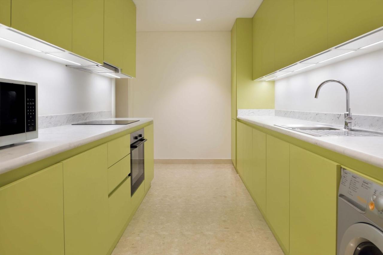 Element By Westin City Center Ντόχα Εξωτερικό φωτογραφία A kitchen in a typical apartment